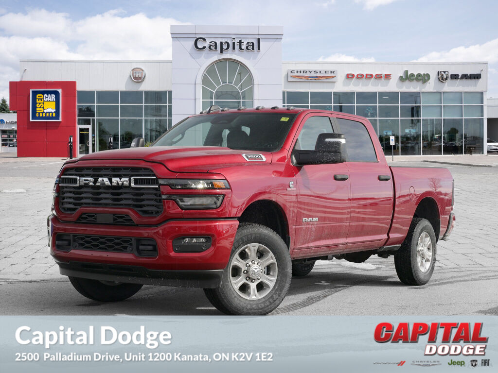 Molten Red Pearl 2026 RAM 3500 Pickup Truck Four-Wheel Drive 8-Speed Automatic