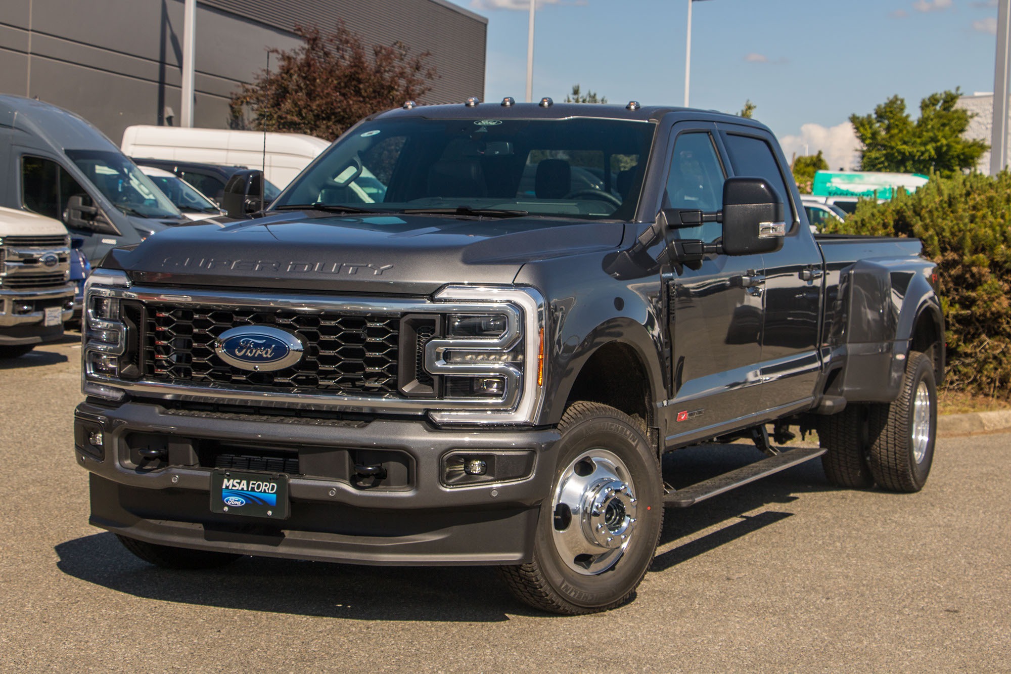 Gray (Carbonized Grey Metallic) 2026 Ford F-350 Super Duty Pickup Truck Four-Wheel Drive Automatic