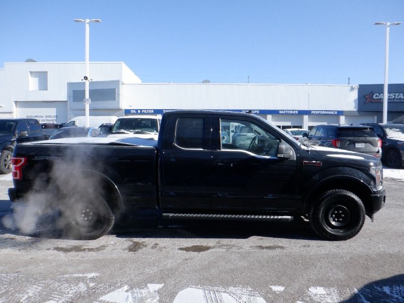 used 2018 Ford F-150 car, priced at $30,815