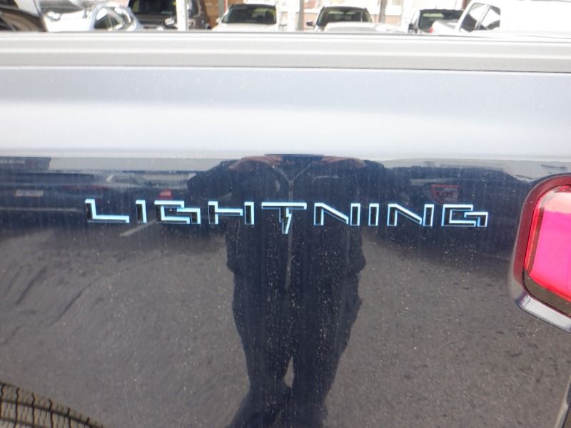 new 2025 Ford F-150 Lightning car, priced at $87,930