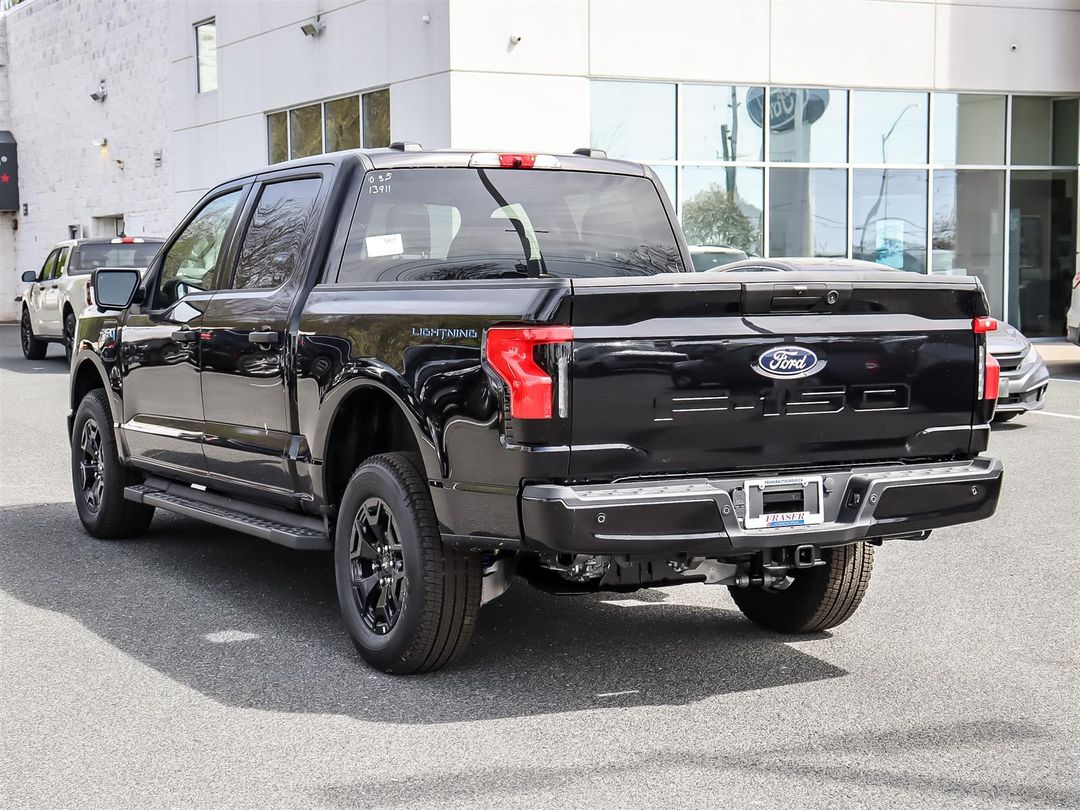 new 2025 Ford F-150 Lightning car, priced at $74,090